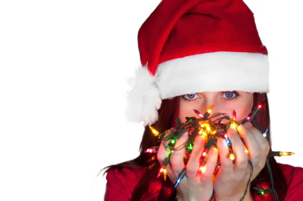 Mujer con luces de guirnalda de Navidad — Foto de Stock