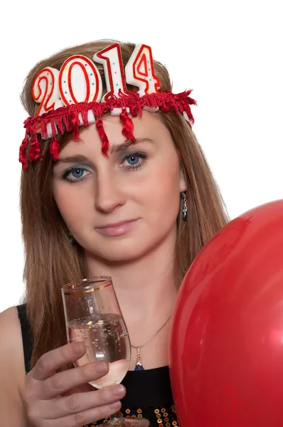 Mulher sorridente segurando champanhe de Ano Novo e balões — Fotografia de Stock