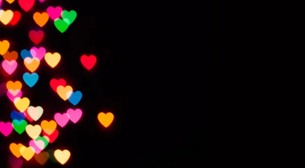 Цветное сердце боке с копировальным фоном пространства — стоковое фото