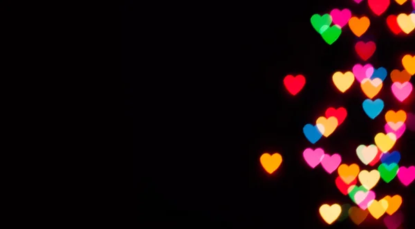 Corazón colorido bokeh con espacio de copia de fondo — Foto de Stock