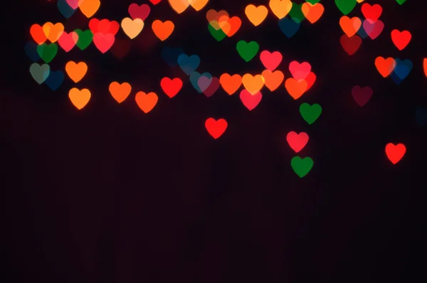 Colorful heart bokeh with copy space background — Stock Photo, Image