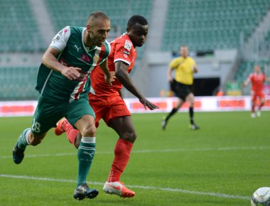 Wroclaw. Polonya - may12: maç t-mobile ekstraklasa wks slask wroclaw ve widzew lodz. Flavio paixao ve okachi princewill