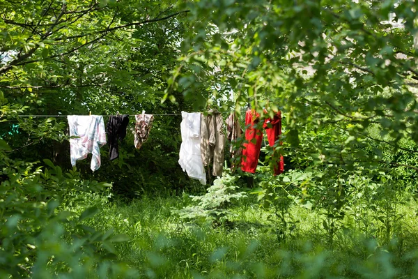 Clothes hanging in the villege — Stock Photo, Image