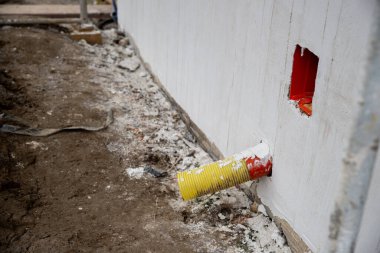drain pipe, gutter, built inside the facade, under construction