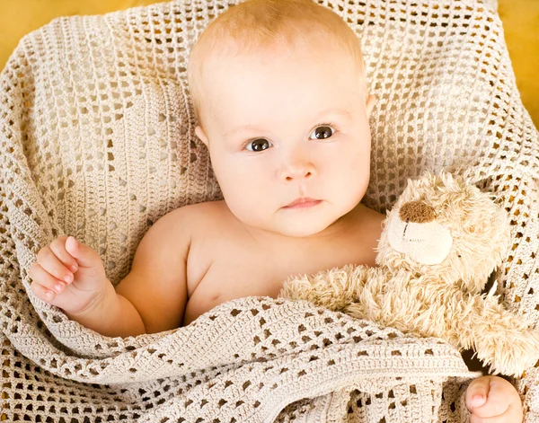 Baby and teddy bear — Stock Photo, Image