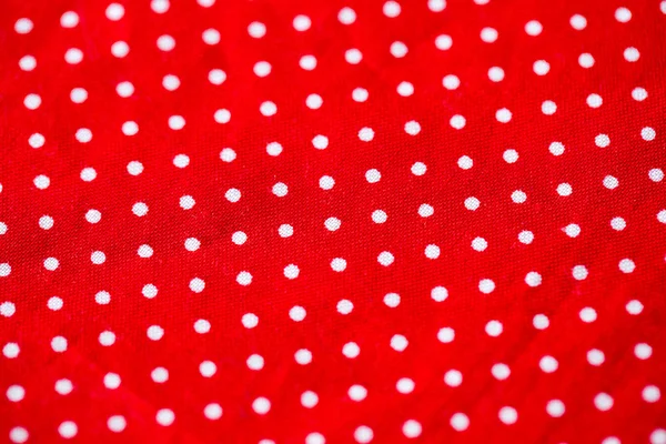 El trozo de tela roja en punto blanco — Foto de Stock