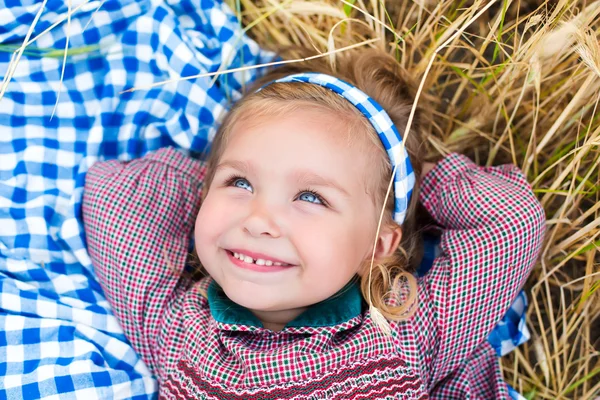 BAby girl at the wheat field — Stock Photo, Image