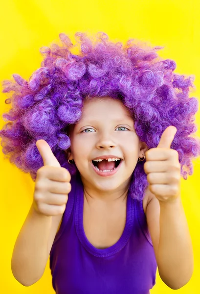 Cute girl in funny wig — Stock Photo, Image