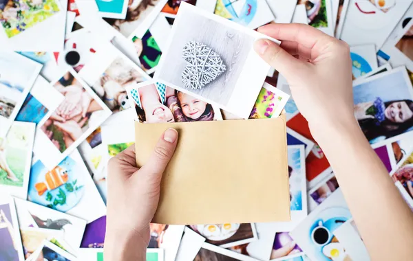 Set of images in family hands — Stock Photo, Image