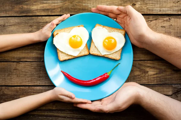 Funny fried eggs for the brakfast — Stock Photo, Image