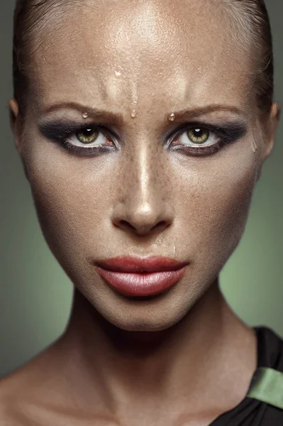 Tense beautiful woman with freckles — Stock Photo, Image