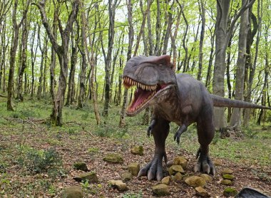 Tarihöncesi bir pangolin modeli olan Tyrannosaurus rex, kalıntılarının Georgia 'da sarkıt mağarada bulunduğu bölgede bulundu.