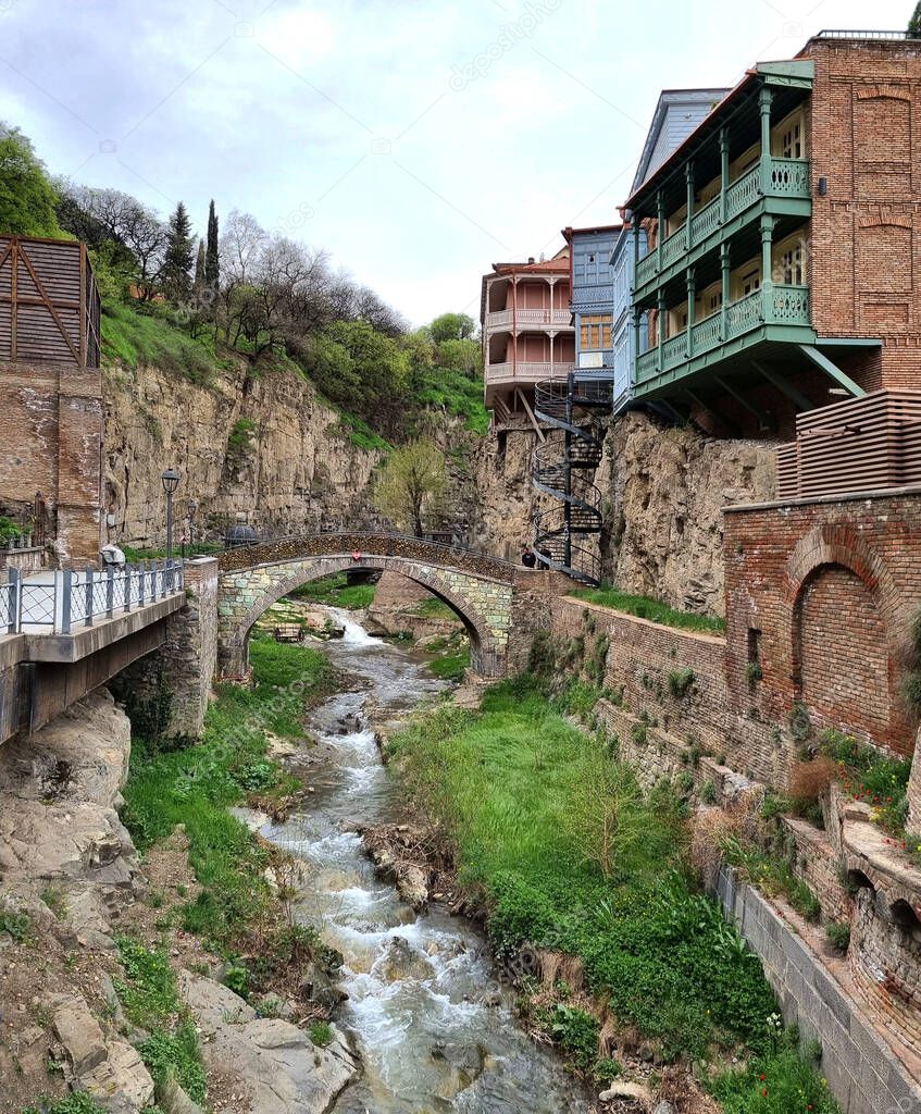 Picturesque romantic place in the old part of Tbilisi with a bridge over a winding stream
