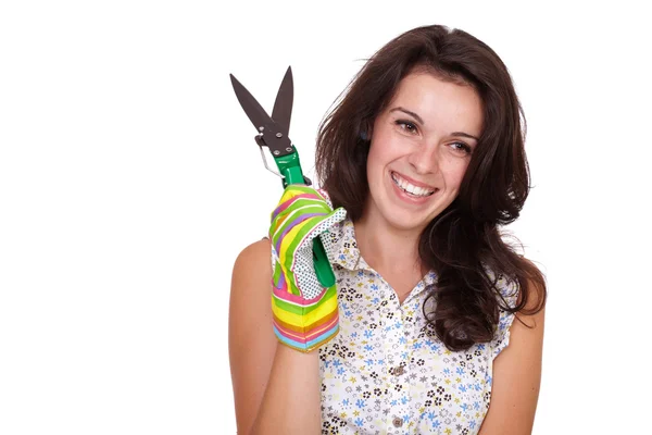 Young smiling gardening girl with secateurs and gloves, isolated — Stock Photo, Image