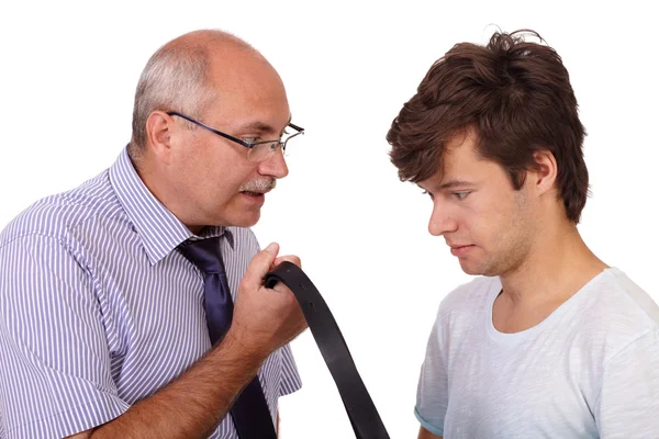 Strict father punishes his young son, isolated on white backgrou — Stock Photo, Image