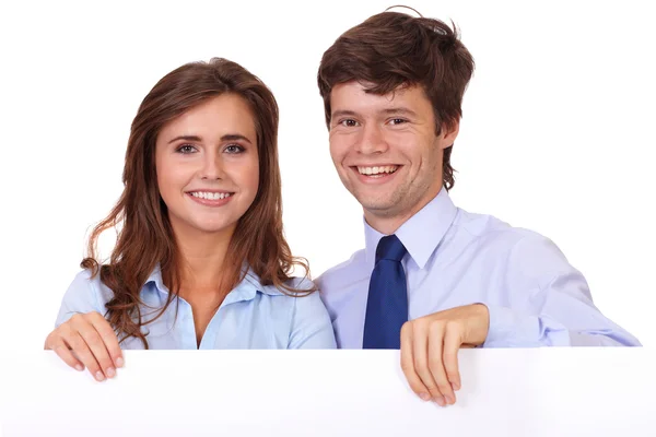 Femme d'affaires avec un homme d'affaires tenant tableau blanc, isolé sur — Photo