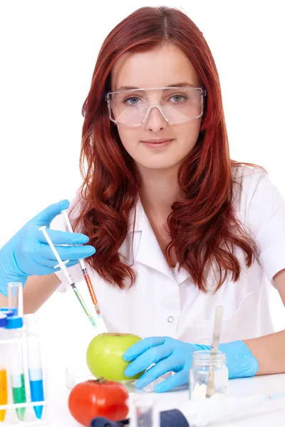 Young attractive smiling female biologist, isolated on white — Stock Photo, Image