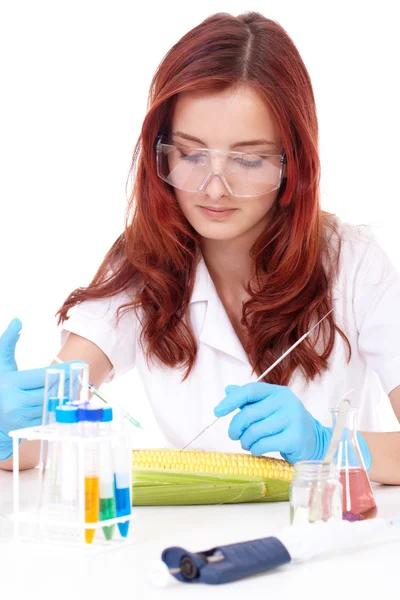 Young attractive smiling female biologist, isolated on white — Stock Photo, Image