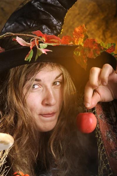 Witch with poisened apple — Stock Photo, Image