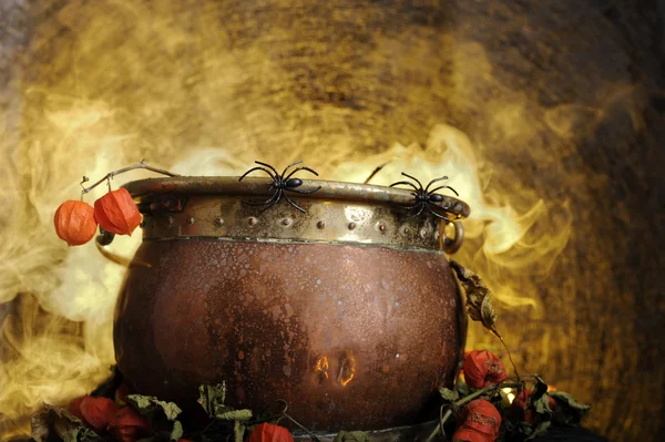 Boiling copper halloween cauldron — Stock Photo, Image