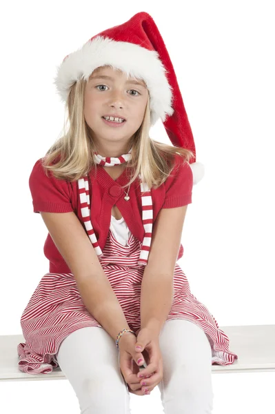 Sourire mignon fille blonde avec chapeau de Noël — Photo