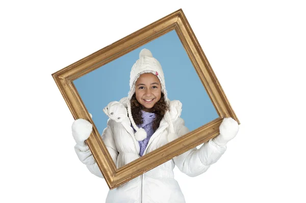 Gril in winterkleren houden een frame — Stockfoto