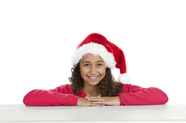 Menina com chapéu de Natal no branco — Fotografia de Stock