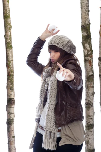 Winter fun:young woman throwing snow balls — Stock Photo, Image