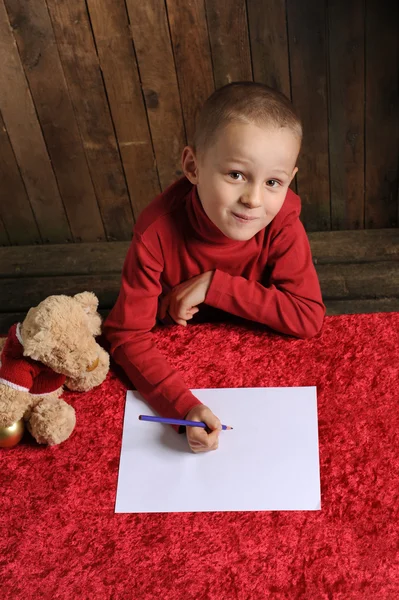 Little boy writing a letter for Santa — Stock Photo, Image