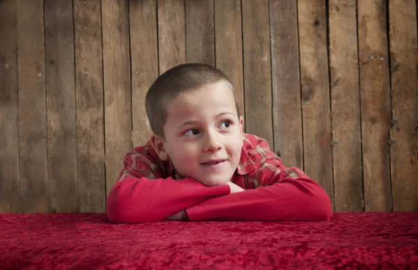 Portrait of a little boy in red — Stock Photo, Image