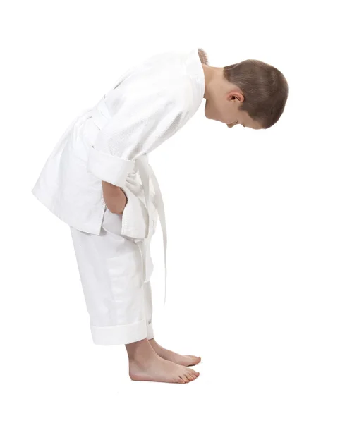 Bowing boy in judo kimono, — Stock Photo, Image