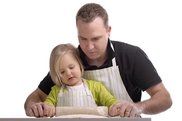 Little girl cooking with her daddy — Stock Photo, Image