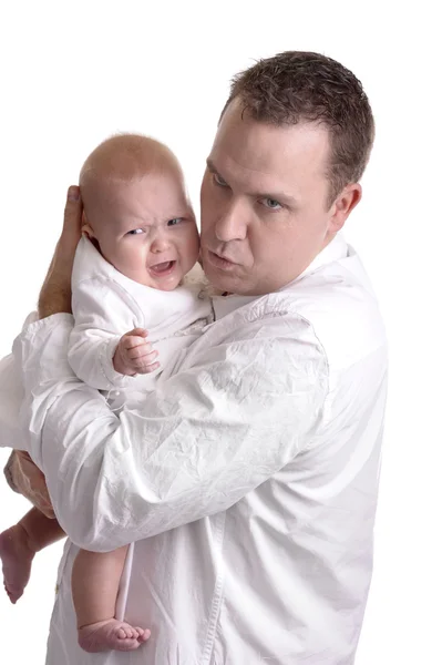 Angry father with crying baby — Stock Photo, Image