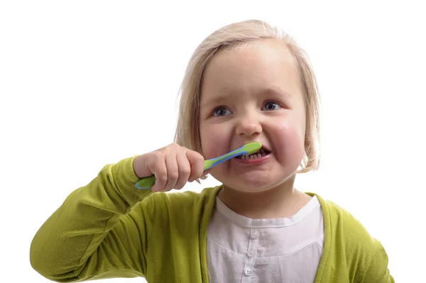 Niña lavándose los dientes Fotos De Stock Sin Royalties Gratis