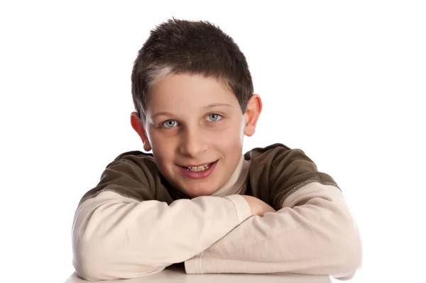 Niño sonriente con ojos azules —  Fotos de Stock