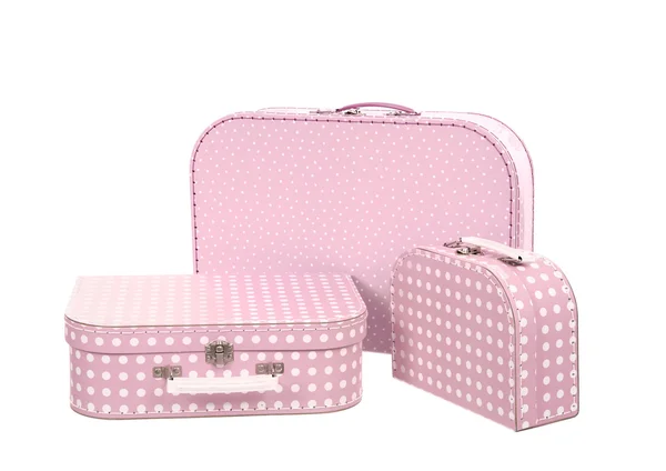 Stos trzy walizki, różowe w białe kropki, na białym tle na whi — Zdjęcie stockowe