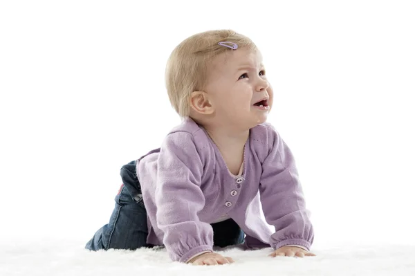 Unhappy crying crawling baby , isolated on white — Stock Photo, Image