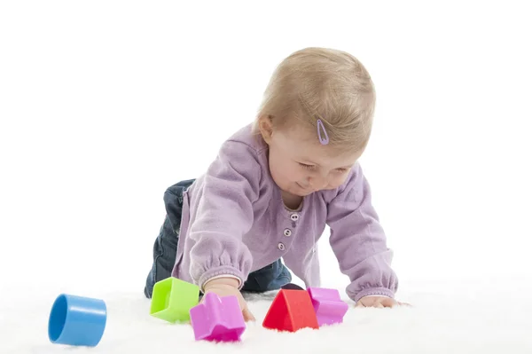 Szczęśliwe dziecko indeksowania z kolorowe kostki, na białym tle — Zdjęcie stockowe