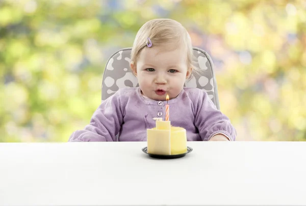 Baby having her first birthday, blurred background — Stock Photo, Image