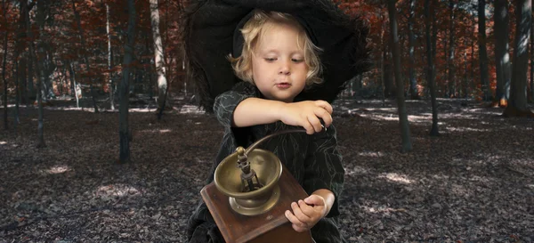 Halloween witch outdoors in the woods — Stock Photo, Image