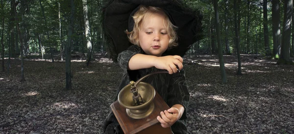 Halloween witch outdoors in the woods — Stock Photo, Image