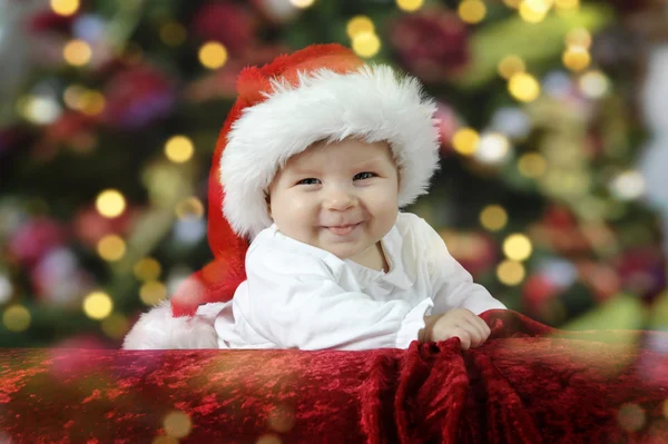 Pequeno santa bebê com chapéu de Natal — Fotografia de Stock