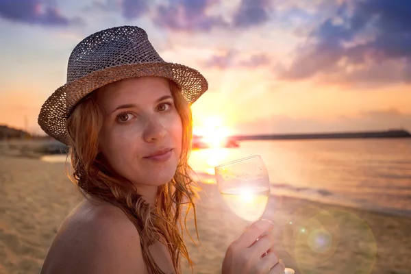 People collection: beautiful lady in hat with glass of wine on t Stock Image