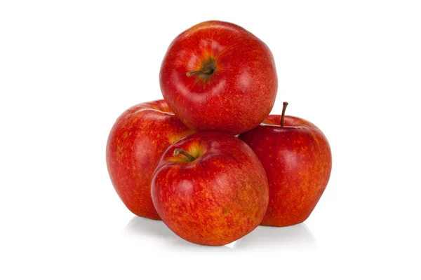 Quatre pommes rouges isolées sur fond blanc — Photo