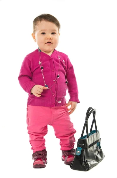 Bambina in posa con borsa a mano — Foto Stock