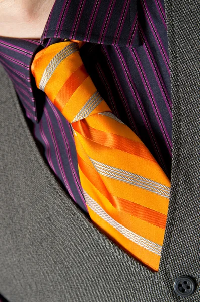 Man wearing orange necktie — Stock Photo, Image