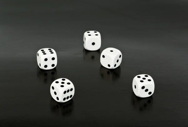 Dices over black — Stock Photo, Image