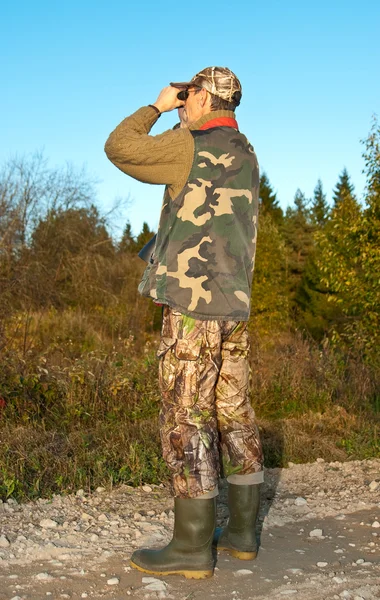 Jäger beobachten — Stockfoto