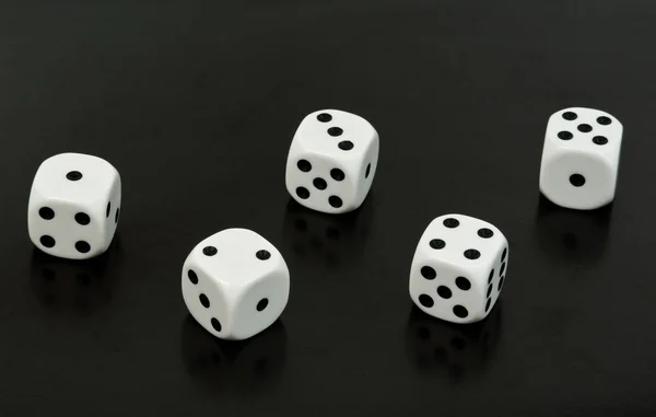 Dices over black — Stock Photo, Image