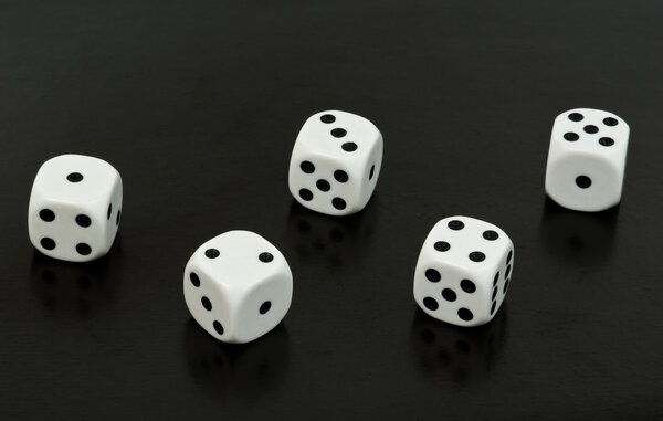 Dices over black